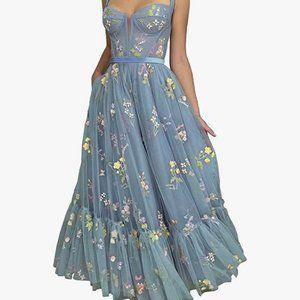 Long tulle dress with embroidered flowers